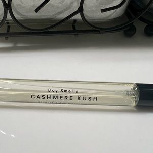 Cashmere Kush by boy smells purse size travel spray perfume.